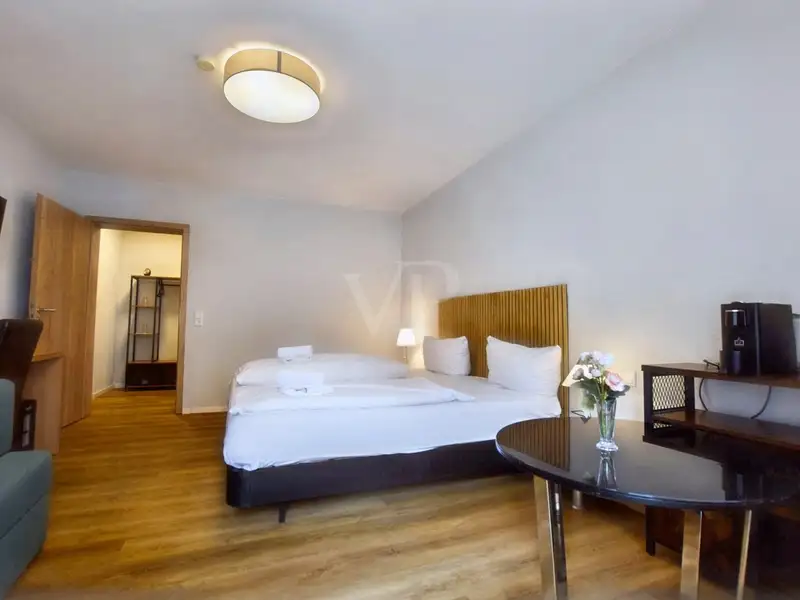 Historic Family-run Hotel in Ansbach with Restaurant, Guest Rooms, and Green Energy Features