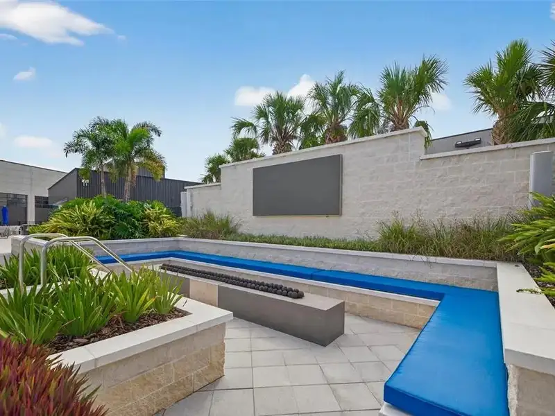 Exclusive Balcony Unit at the Motor Enclave with Private Garage and Racetrack Views