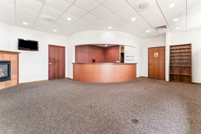 Versatile Commercial Condo for Sale Near Hwy 151 & 41 with Multiple Offices and Amenities