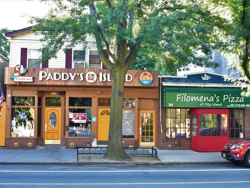Adjoining Commercial Properties with Apartments in Prime City Island Location