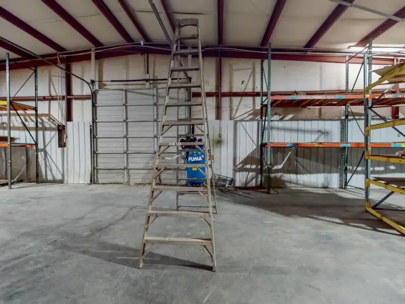 Commercial Property on Busy Highway - 2.1 Acres, 31,000 Sq Ft with Offices and Roll-up Doors