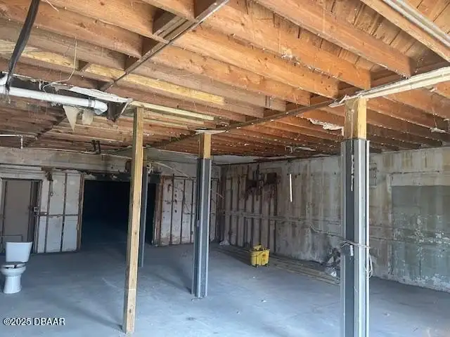 Multi-parcel Offering: Two-story Building with Renovation Potential in Prime Location
