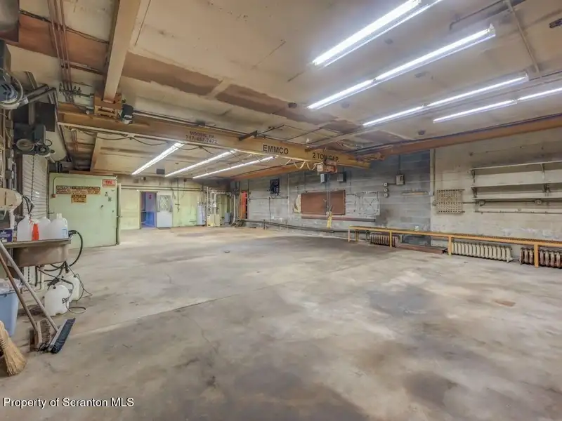 Mixed-use Property in Throop: 7-bay Garage and Updated 2-bedroom Apartment
