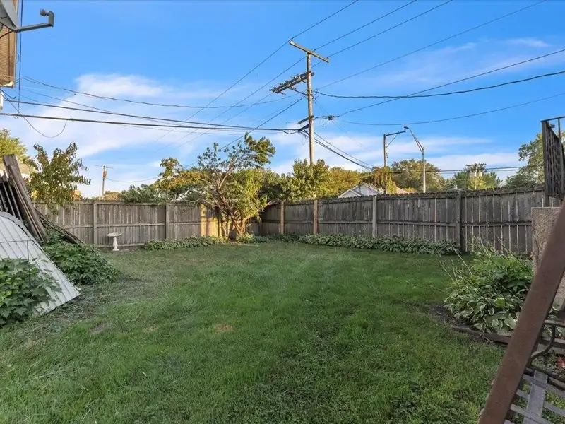Versatile Corner Commercial Property with Retail Space and Two Apartments in Prime Location