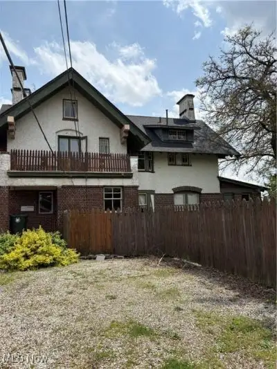Updated Tudor Office Building with Residential Potential in Canton Near Downtown