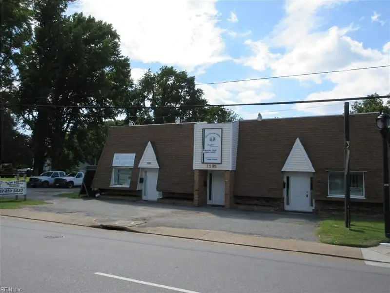 Turnkey Fully Leased Office Building with Garages in Prime Langley Afb Location