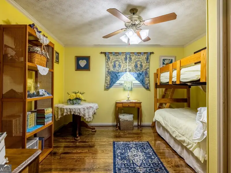 27 Acres with 2,400 Sq. Ft. Home, Duplexes, Pool, and Barn in Prime Location