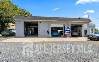 Turnkey Automotive Business with Car Dealership, Mechanic & Auto Body Shop in Prime Location