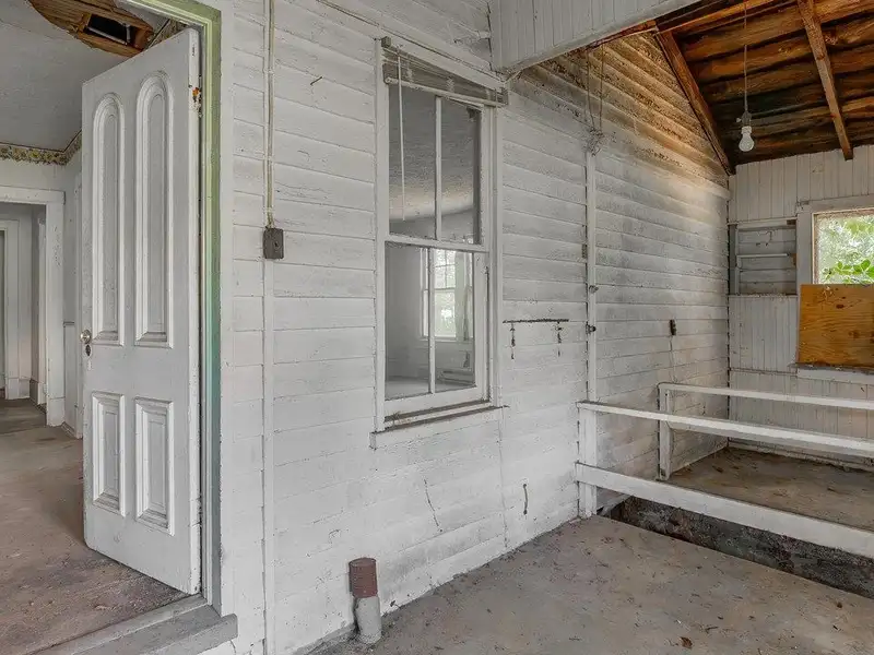 Classic American Foursquare Home in Need of Restoration with Detached Garage