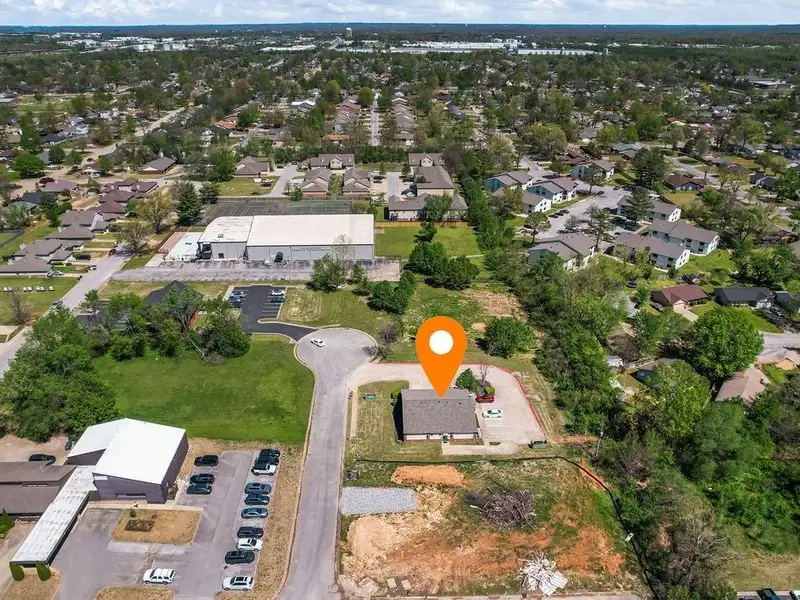 Versatile 2,752 Sq Ft Office Building in Central Rogers with Five Private Offices