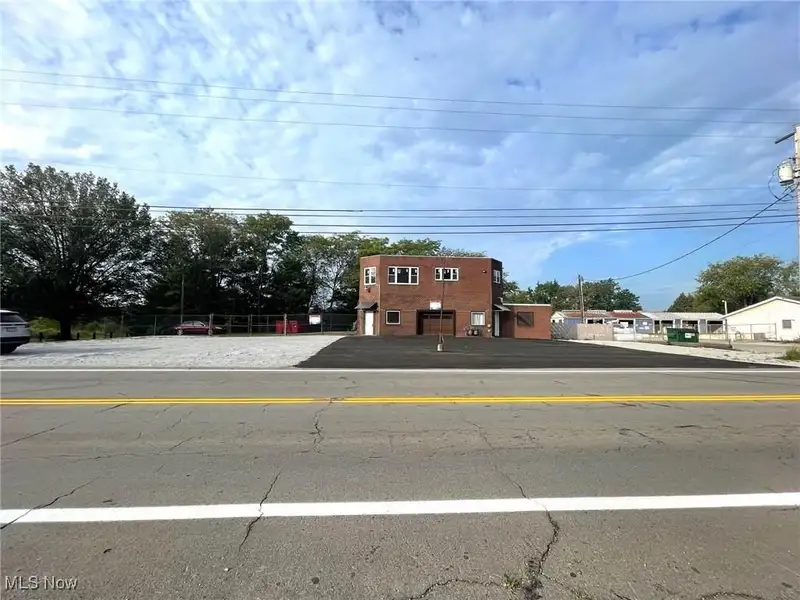 Updated Mixed-use Brick Building with Retail and Office Space in Prime Location
