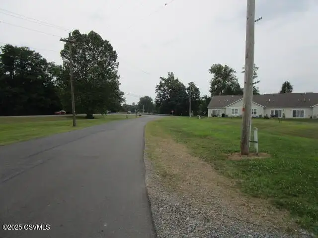 Partially Built Condo Development with Approved Plans in Picturesque Location