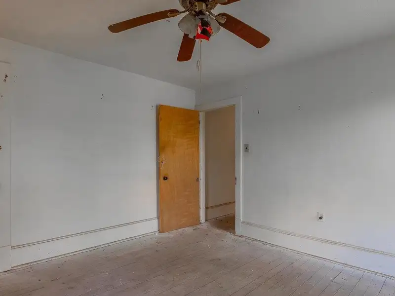 Classic American Foursquare Home in Need of Restoration with Detached Garage