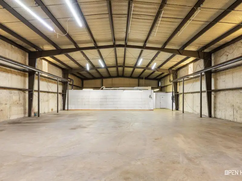 Insulated Warehouse and Office Space with Crane, Fenced Yard in Prime Location
