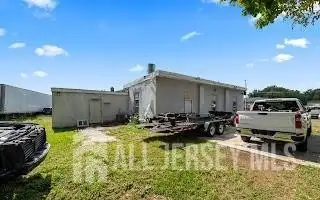 Turnkey Automotive Business with Car Dealership, Mechanic & Auto Body Shop in Prime Location
