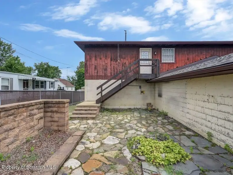 Mixed-use Property in Throop: 7-bay Garage and Updated 2-bedroom Apartment