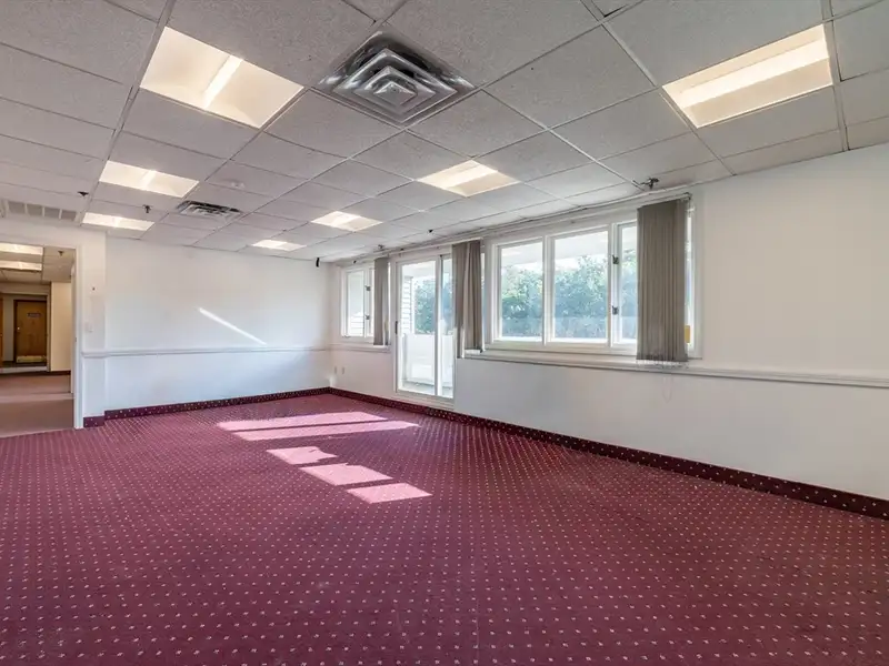 Freestanding Four-story Office Building with Parking on Route 114, North Andover