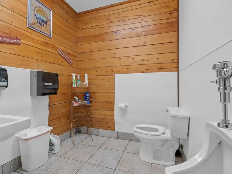 Established Log Cabin Liquor Store for Sale on Highway 70 with Drive-through Access