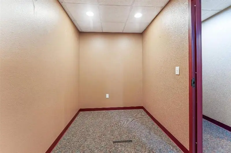 Versatile Commercial Condo for Sale Near Hwy 151 & 41 with Multiple Offices and Amenities
