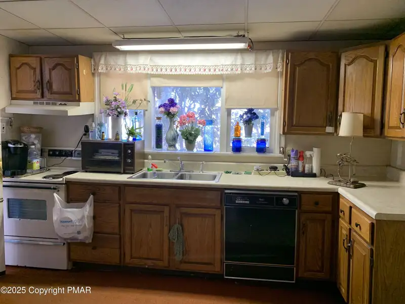 Prime 2-acre Commercial Property with 3-bedroom Home in High Traffic Area