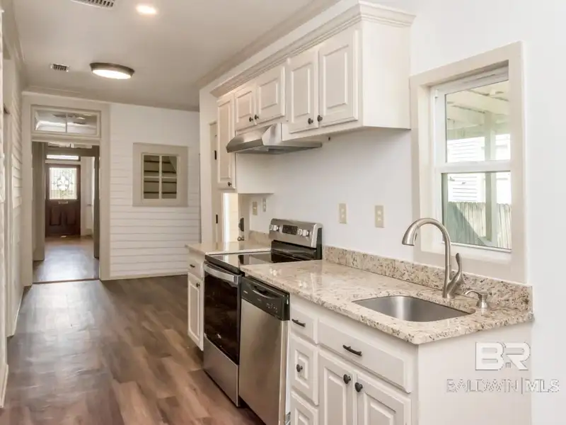 Mixed-use Property in Downtown Mobile, Alabama with High Ceilings and Hardwood Floors