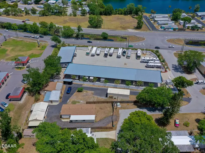 Mixed Use Property: Light Industrial Lot with Adjoining Residential Home and Expansion Potential
