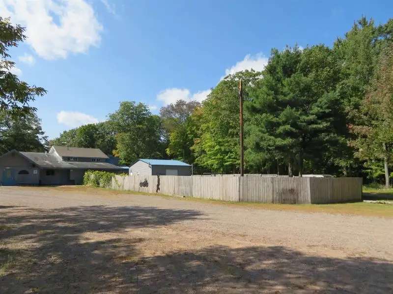 Turnkey Bar/restaurant with Apartment, Highway Access, and Development Potential in Northwoods