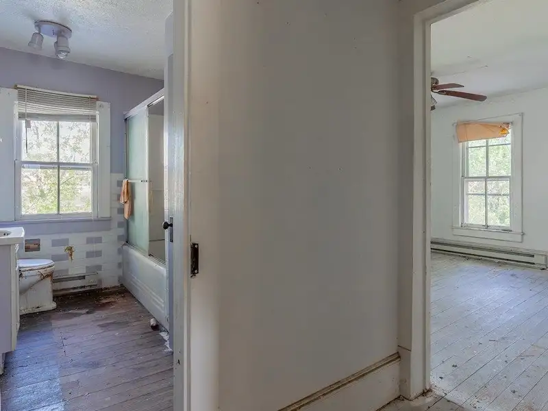Classic American Foursquare Home in Need of Restoration with Detached Garage