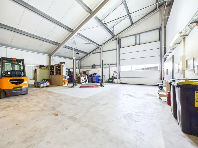Modern Commercial Building with Exclusive Living Space in Aurich's Schirum Ii Industrial Estate