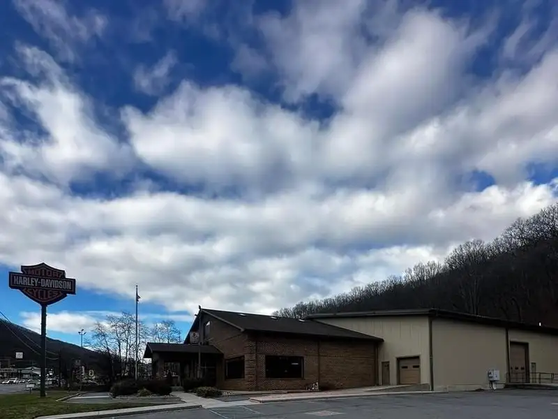 Versatile Commercial Property with Showroom, Offices, and Large Metal Building in Prime Location