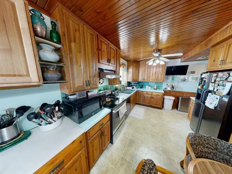 Turnkey Custom Plastics Manufacturing Business with Attached Home on 1.67 Acres