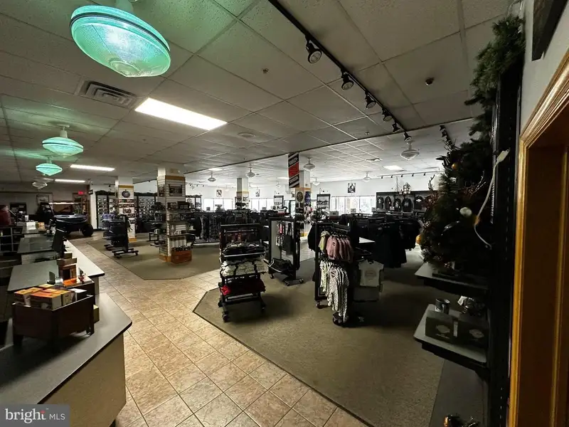 Versatile Commercial Property with Showroom, Offices, and Large Metal Building in Prime Location