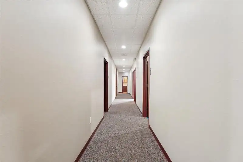 Versatile Commercial Condo for Sale Near Hwy 151 & 41 with Multiple Offices and Amenities