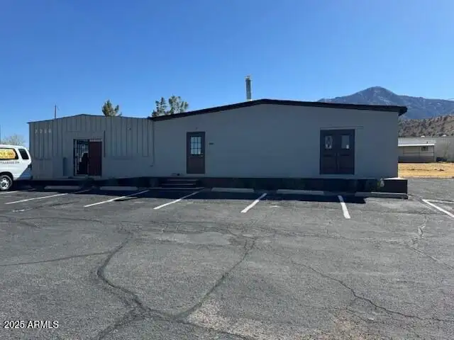 Versatile Commercial Property at High-traffic Intersection, Ideal for Business or Residence