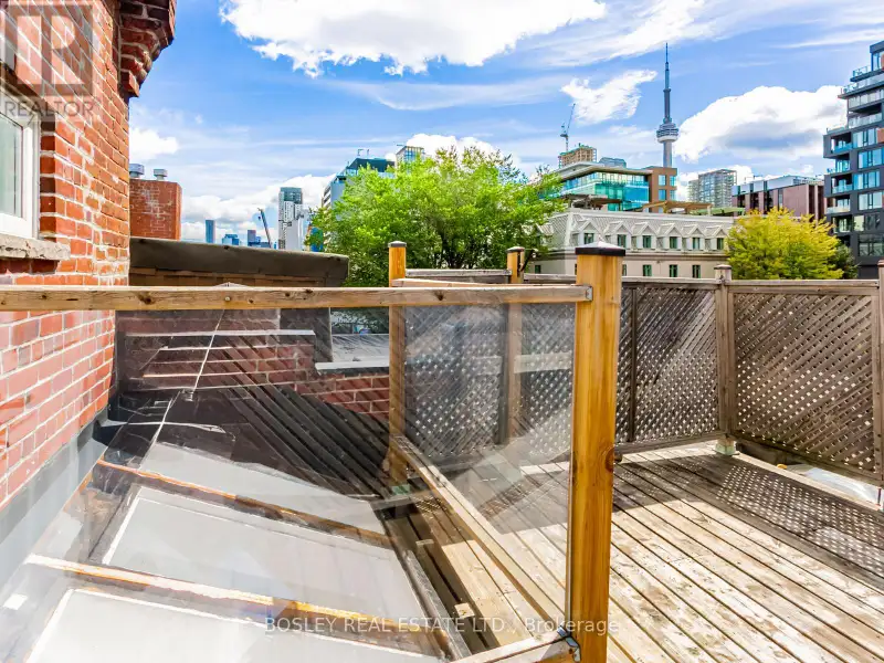 Charming Two-storey Apartment in Landmark Building on Queen St West