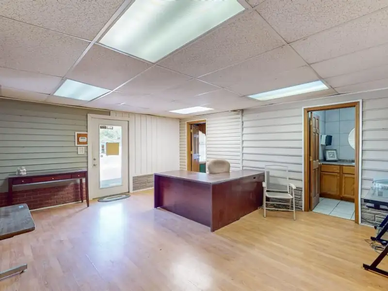 Commercial Property on Busy Highway - 2.1 Acres, 31,000 Sq Ft with Offices and Roll-up Doors