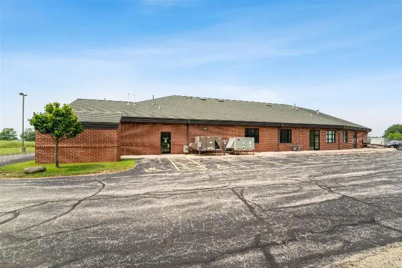 Versatile Commercial Condo for Sale Near Hwy 151 & 41 with Multiple Offices and Amenities