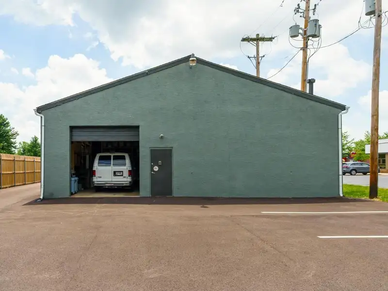 Prime Commercial Building in Downtown Reynoldsburg with Parking and Industrial Garage