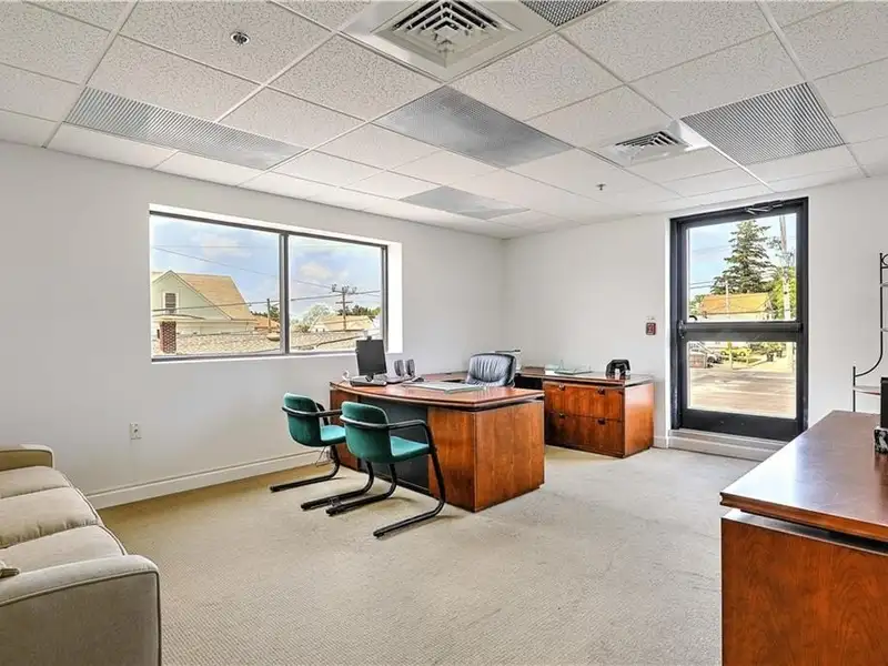 Versatile Multi-level Commercial Building with High Visibility on Major Corridor