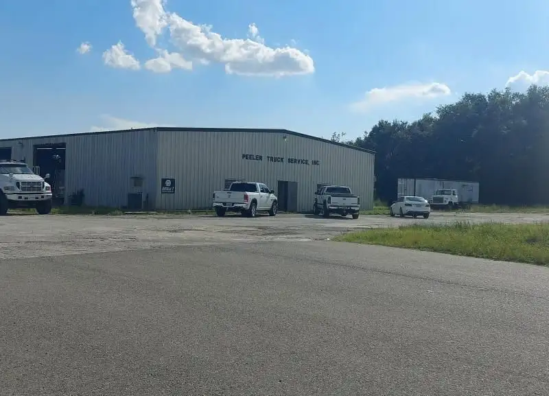 10.94-acre Commercial Property with 7,500 Sq Ft Warehouse on State Rd 46 Frontage