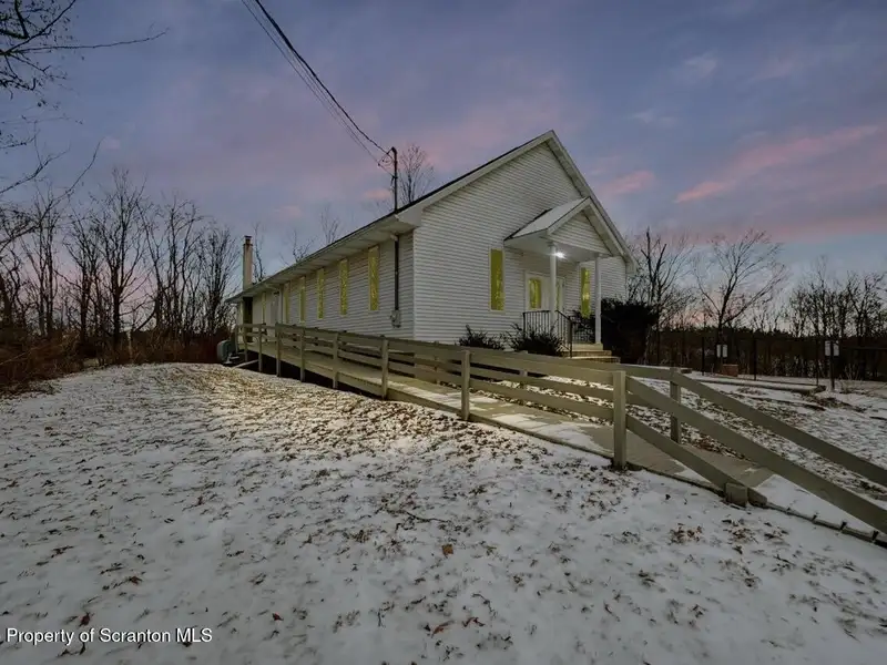 Versatile Former Church Building in Peaceful Location with Ample Parking and Creative Potential