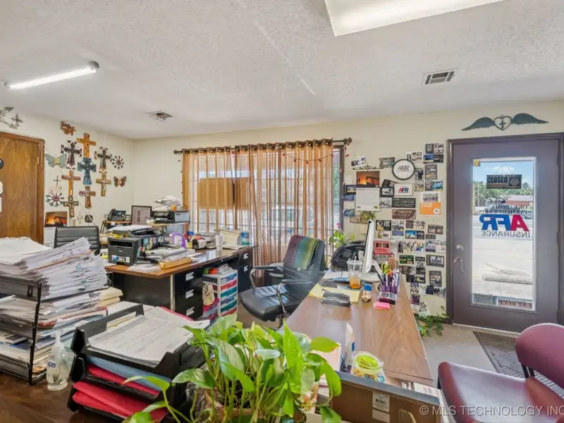 Fully-occupied Office Suite Building in Downtown Checotah with Five Units