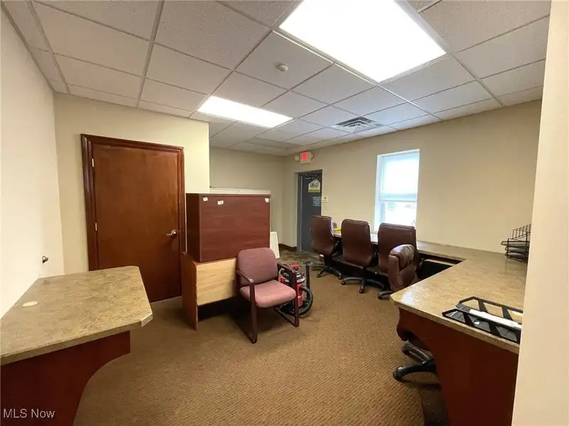 Well-maintained Two-story Brick Building with Retail and Workshop Space in Ne Location