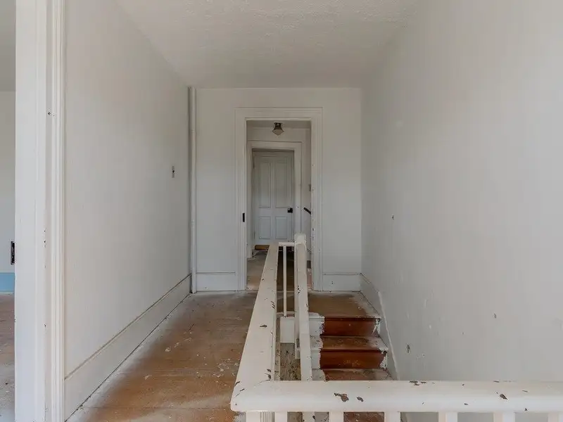 Classic American Foursquare Home in Need of Restoration with Detached Garage