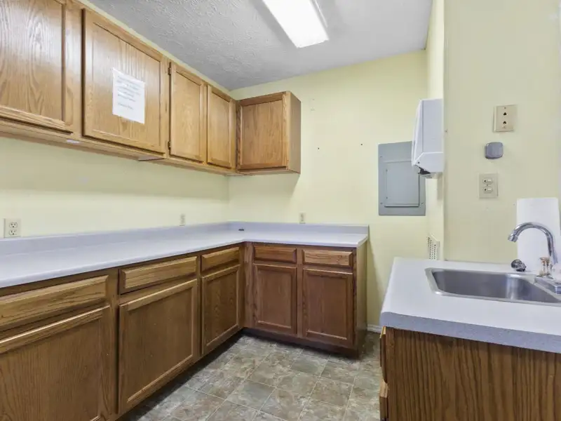 Versatile 4,305 Sq Ft Office Building with Apartment on Highway 11e