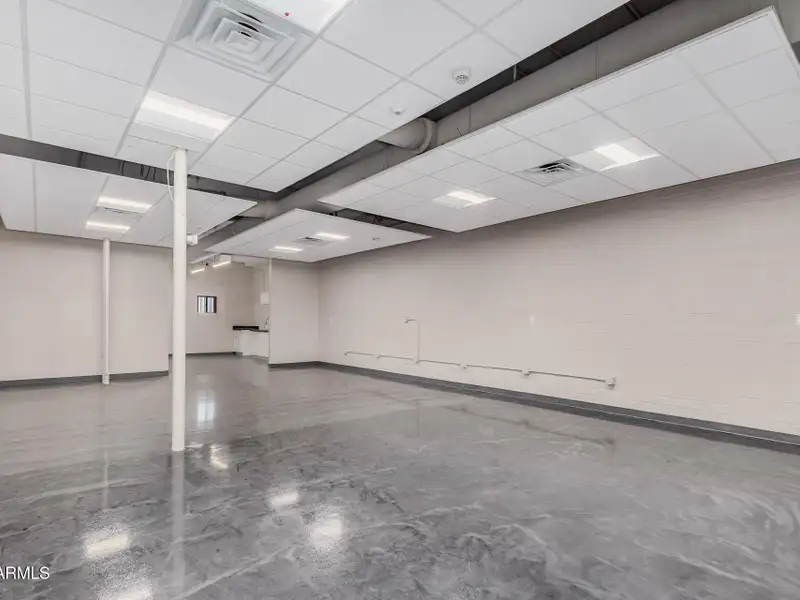 Versatile Commercial Property with Two Buildings and Ample Parking in Prime Location