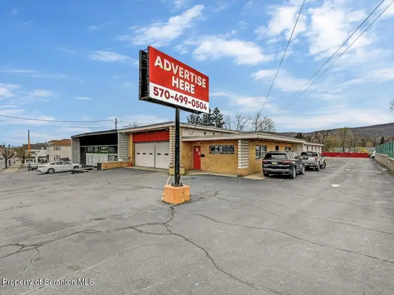 Mixed-use Building with Retail Space and Parking for Sale in Prime Location
