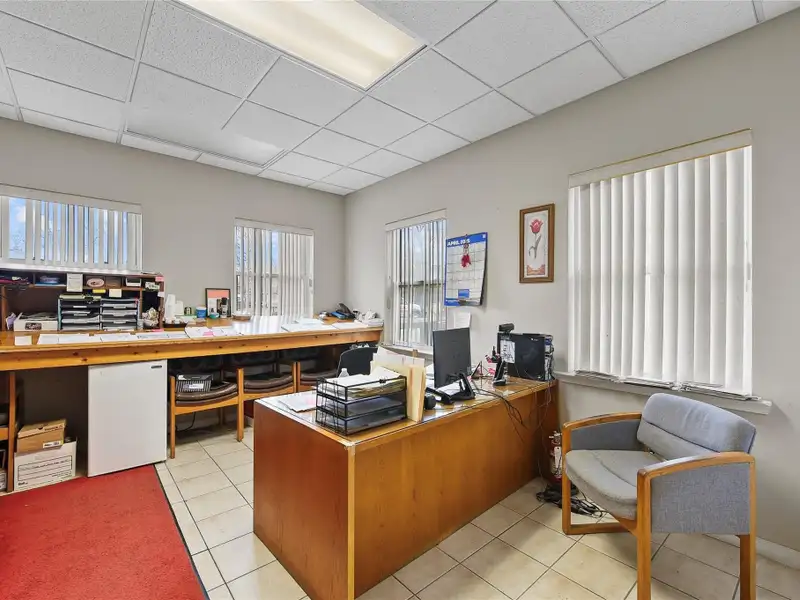 Mixed-use Property with Office, Garage, and Fully Rented Apartments in Middletown