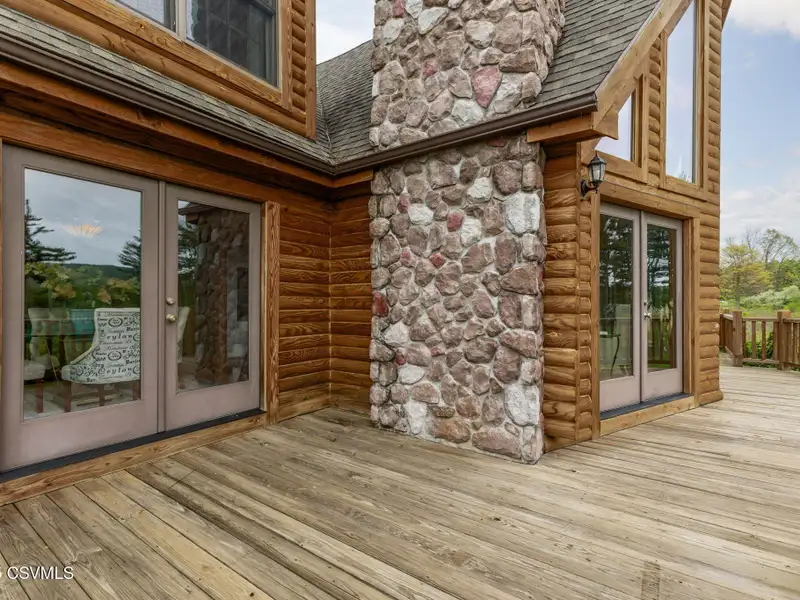 Commercial Log Home on 2 Acres with 3 Bedrooms and Scenic Views