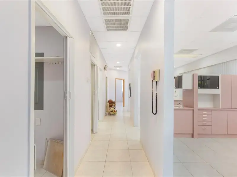 End Unit Tri-plex Commercial Space with Parking in Prime Location